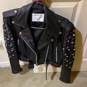 Black leather jacket with star studs